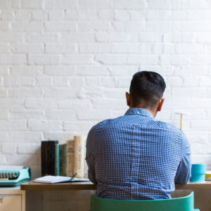 man working at home office