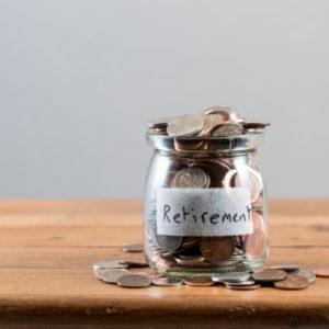 retirement jar of money coins saving ira